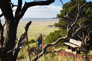 Capulin Volcano National Monument - hikers along the rim trail, by Tim Keller
