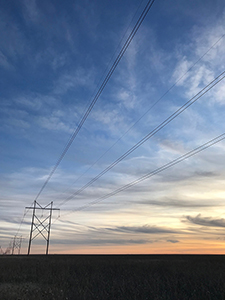 Kansas power lines at sunset, by Tim Keller