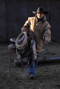 Brittany Rouse carries her saddle