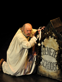 Joe Zink as Scrooge