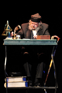 Joe Zink as Scrooge