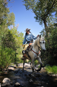 Marcia Hefker horseback on Trinchera Creek