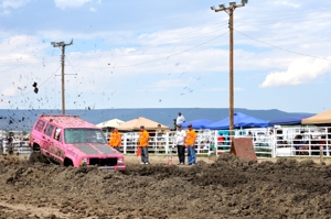 Cathy Howe, Raton mud bog racing 2013, pink SUV