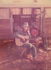Tim Keller camping in Oregon, 1972, playing Yamaha FG180 guitar