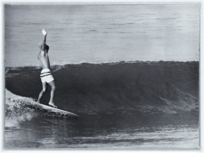 Tim Keller surfing at Santa Monica Will Rogers State Beach, c1965
