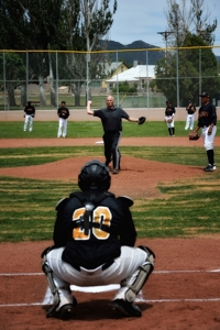 Butch McGowen throws first pitch at Raton Osos game, 2014