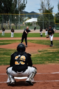 Butch McGowen throws first pitch at Raton Osos game, 2014