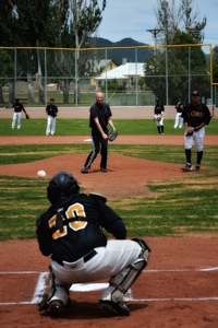 Butch McGowen throws first pitch at Raton Osos game, 2014