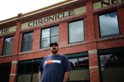 Adam Sperandio at The Chronicle-News, portrait by Tim Keller