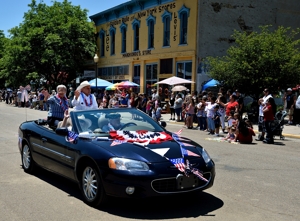 Fabie & Andy Solano in Raton's Fourth of July parade, 2015