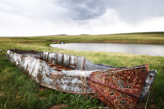 Johnson Mesa boat at stock pond by Tim Keller