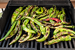 New Mexico green chile roasting on the grill