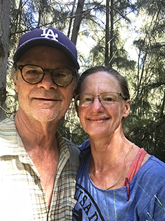 Tim Keller and Christina Boyce hiking in Pūpūkea Forest Reserve