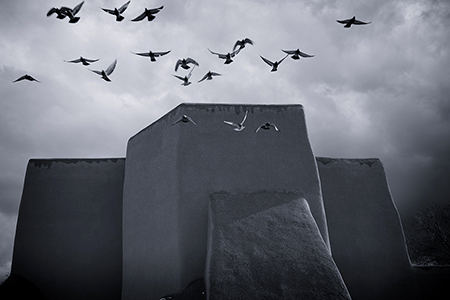 Birds take flight at San Francisco de Asis Mission Church, Ranchos de Taos, NM, by Tim Keller