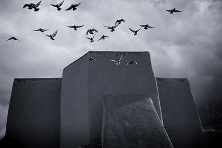 Birds take flight at San Francisco de Asis Mission Church, Ranchos de Taos, NM, by Tim Keller