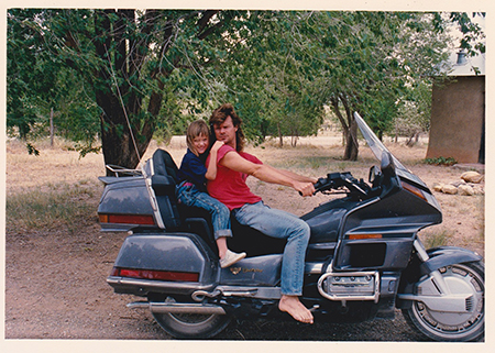 Darcy Day Keller and Tim Keller on Tom Noe's motorcycle, Serafina, NM 1989