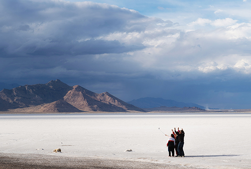 Japanese tourists take selfie at Bonneville Salt Flats