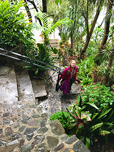 Christina Boyce ascends steep stairs at La Casa del Mundo on Lago de Atitlan.