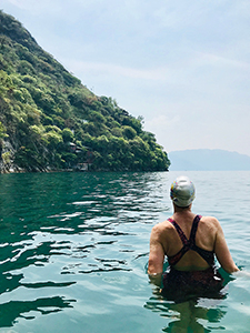 Christina Boyce begins swim across bay on Lago de Atitlan, La Casa del Mundo, Guatemala