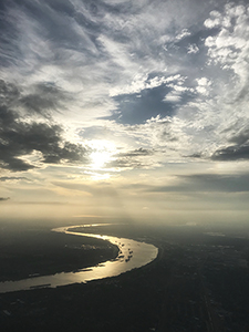 Barges and freighters on the Mississippi River at New Orleans, view from American Airlines jetliner