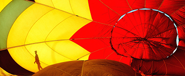 "Outside the Envelope" - hot air balloon silhouette by Tim Keller
