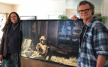 Tim Keller and Christina Boyce with "Serafina, 1988" painting by Lindsay Hand Christina Boyce and Tim Keller at home in Raton, New Mexico, with their Lindsay Hand painting, "Serafina, 1988"