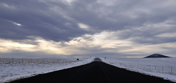 Johnson Mesa road in winter, photograph by Tim Keller