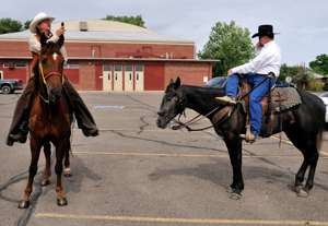 cell phones horseback, Swink Colorado parade