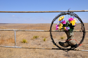 Cowboy wreath on ranch gate