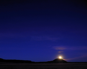 Capulin Volcano moonrise, "Rhapsody in Blue" photograph by Tim Keller